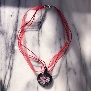 Red ribbon flower necklace